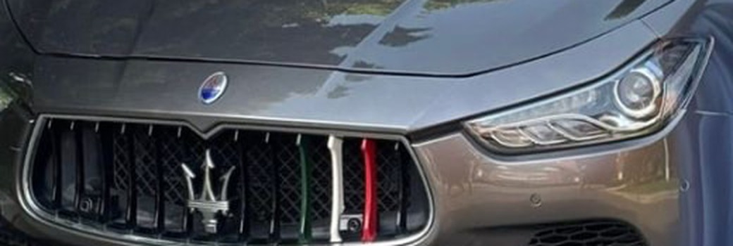 Grille, trident and Italian tricolour detail on the Maserati Ghibli